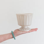 ivory plastic footed vase